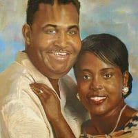 Pastel portrait of a woman and her boyfriend embracing in a pastel drawing.