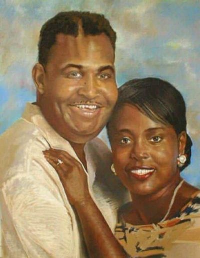 Pastel portrait of a woman and her boyfriend embracing in a pastel drawing.